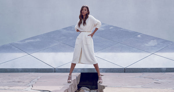 Chic lady with legs in two different worlds